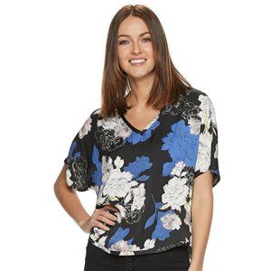 Jennifer Lopez Dolman sleeve floral top